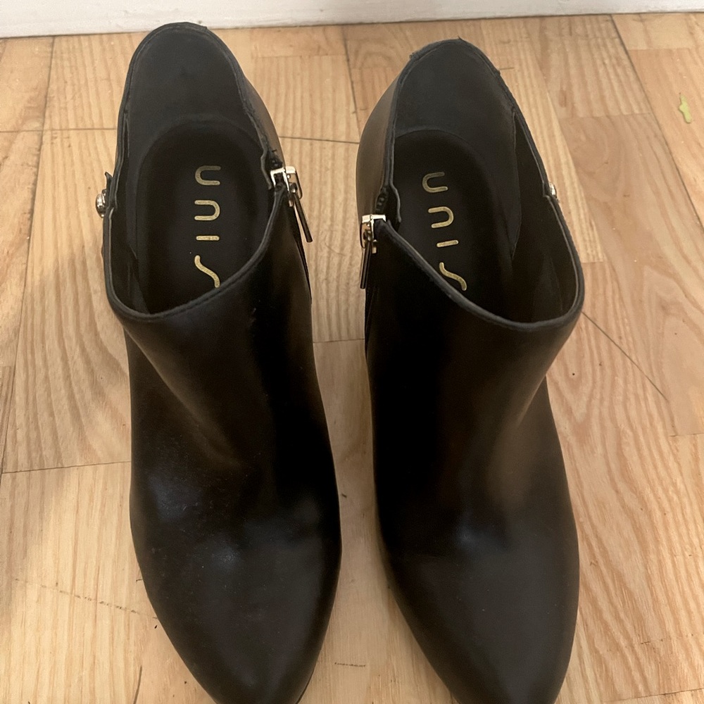 Black Unisa booties approx 3” heels.  Size 8.5.  Good Condition